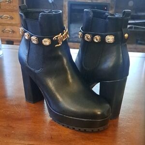 Juicy Couture Black Heeled Boots with Gold Embellishments